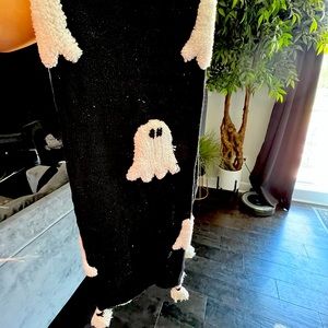 Rachel Zoe ghost blanket with tassels.
